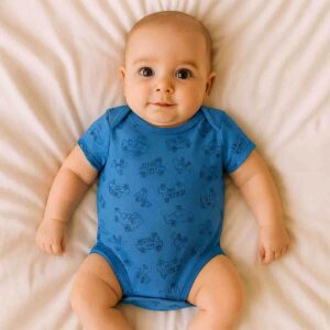 A toddler wearing a police vehicle designed dark blue baby bodysuit