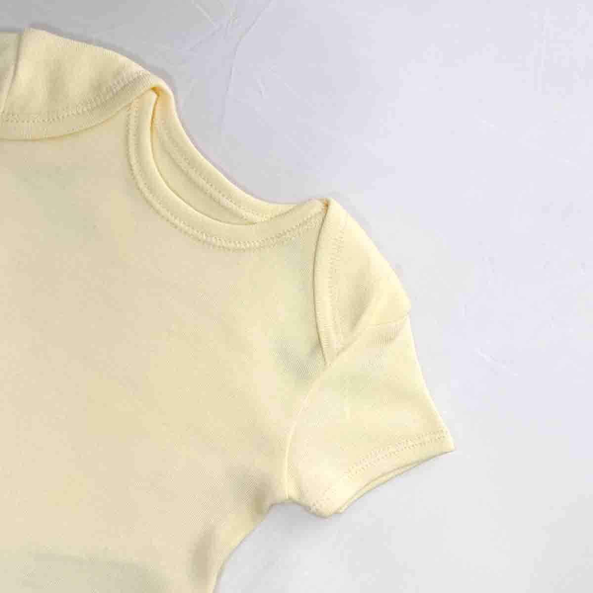 Luna white classic baby bodysuit close-up view