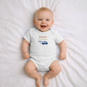 A toddler is wearing a Ready Steady Go Bodysuit