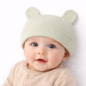 baby bear hat in sage green with ribbed fabric and bear ears worn by a baby