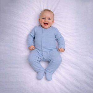 Baby blue sleepsuit with long sleeves and soft fabric