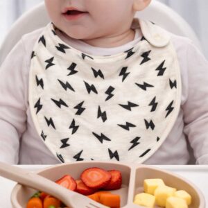Black lightning bandana baby bib worn by a baby during feeding time