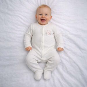 Love you so much baby sleepsuit worn by baby showing sweet message detail