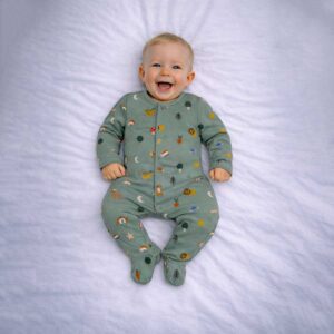 Sage green baby sleepsuit with animal and nature print